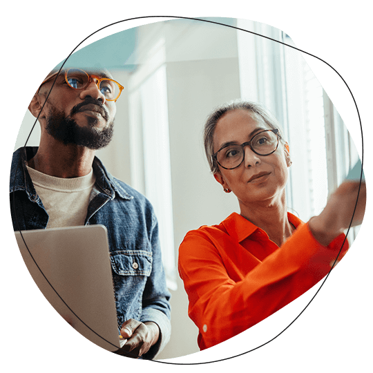 Two people discussing email marketing strategy